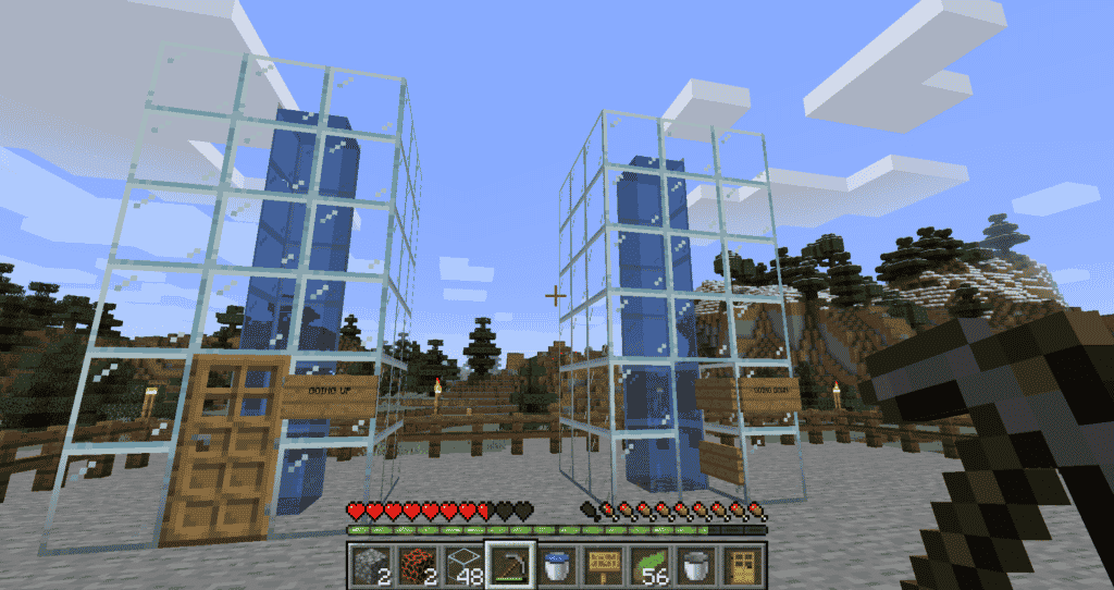 Our final water elevator built in minecraft, one going down using a magma block, and another going up using soul sand. 